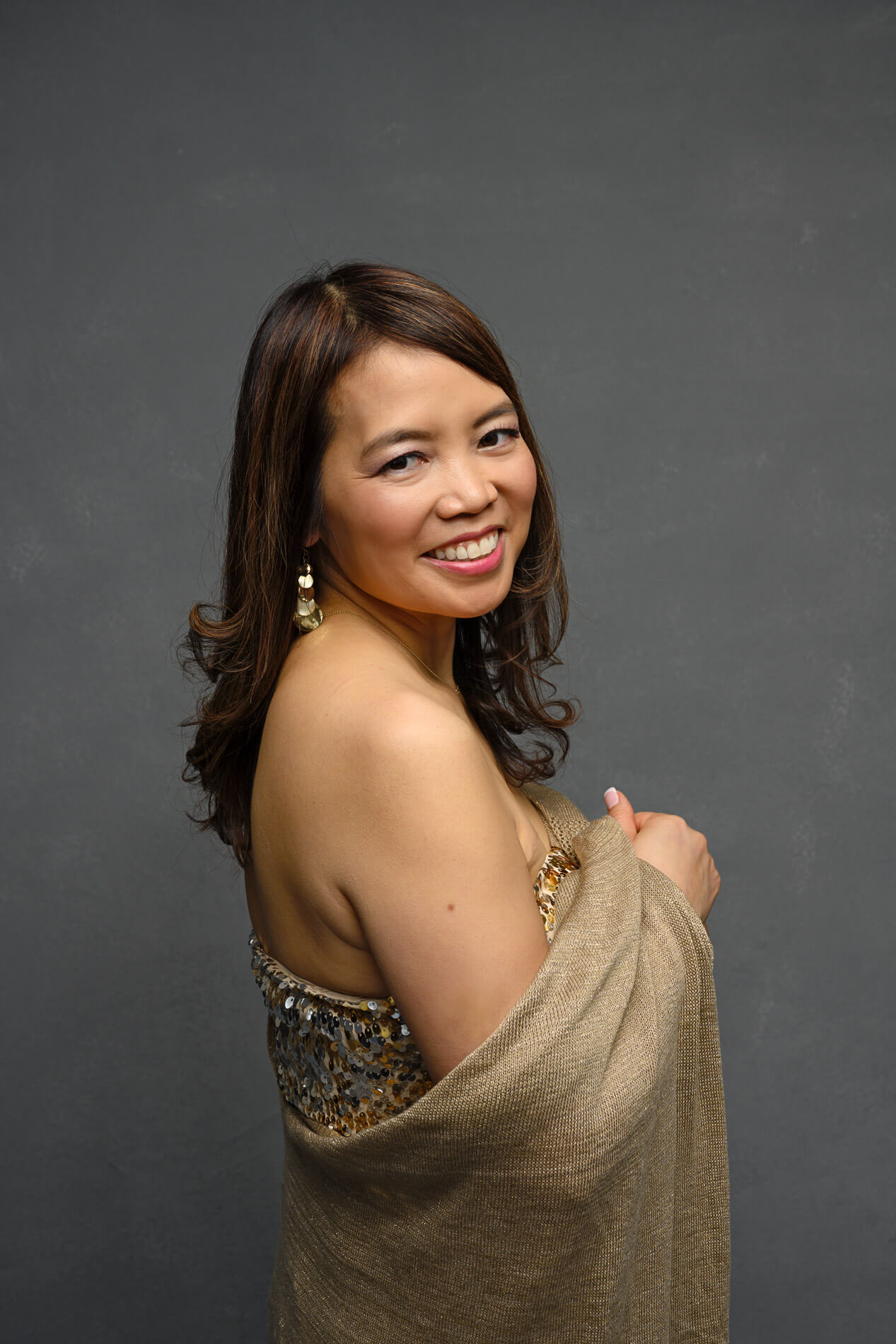 Survivor Portraits in the Planet Photo Studio in a beautiful gold dress