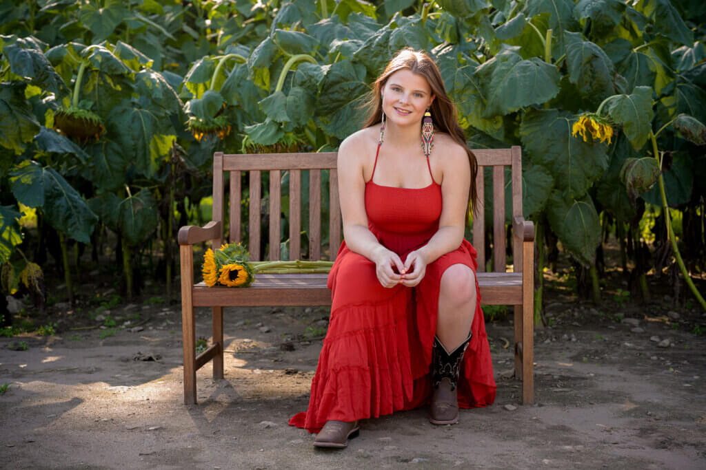 A sunflower farm in Woodbury CT for senior portraits in CT of Katie