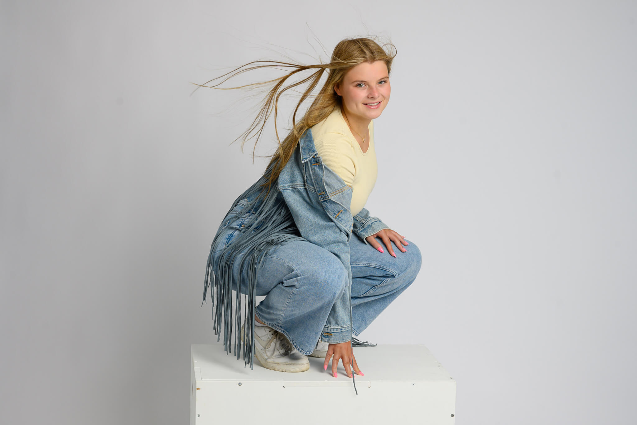 Studio photoshoot of a teen with a simple gap ad vibe