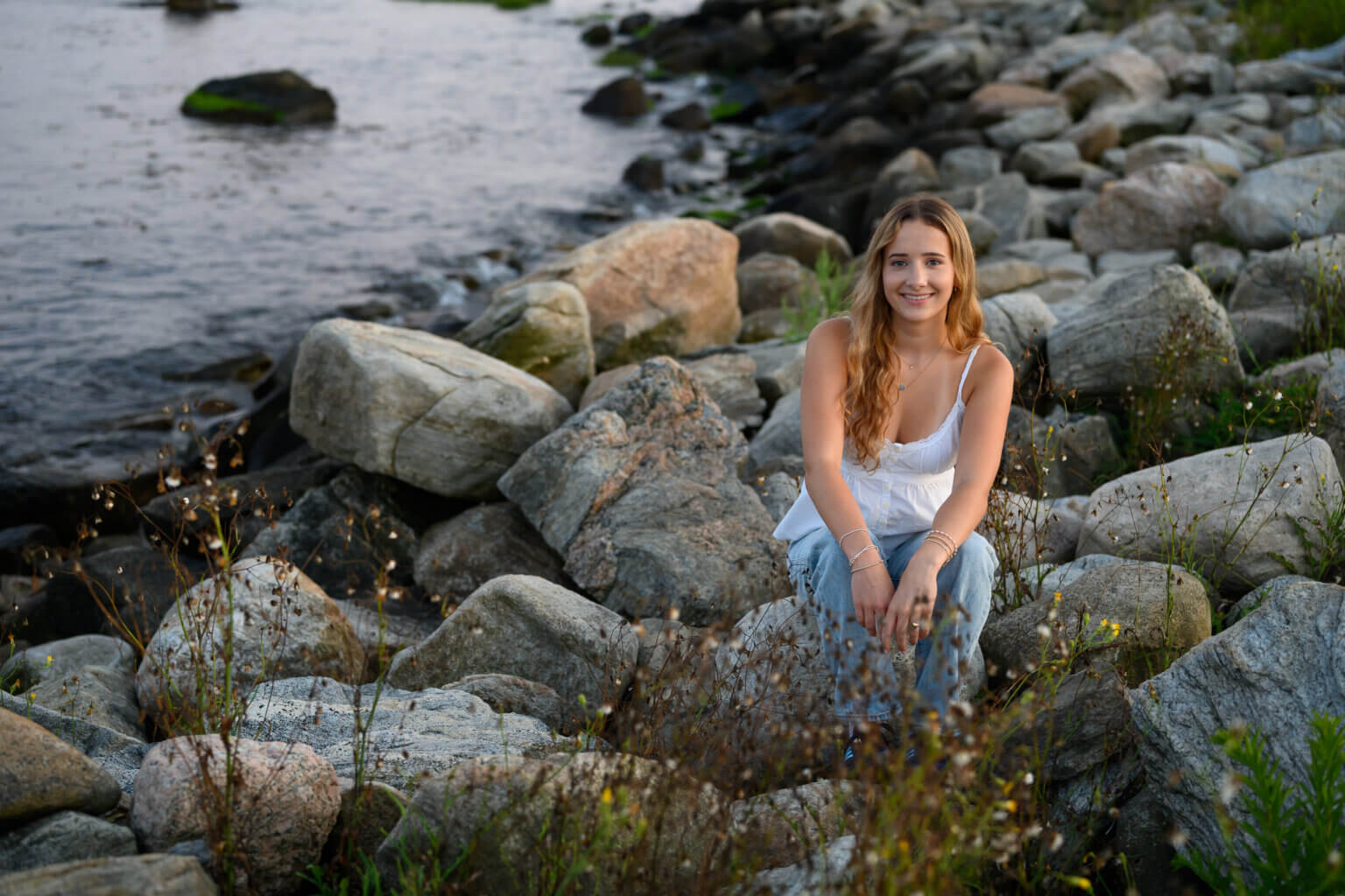Senior Portrait of a girl on the rocky coast