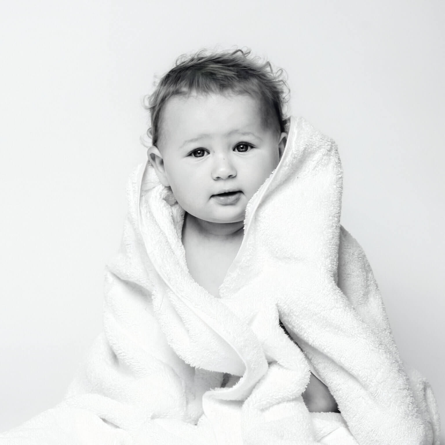 black and white studio portraits of children